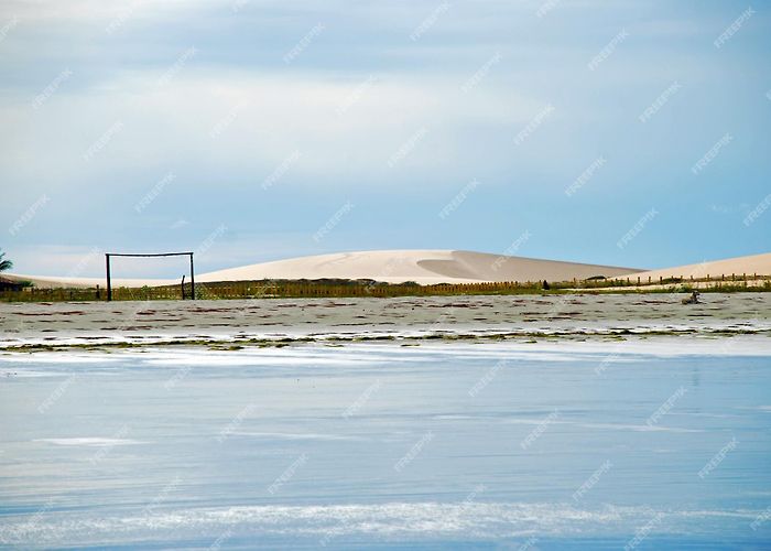 Jericoacoara Beach Premium Photo | Jericoacoara is a virgin beach hidden behind the ... photo