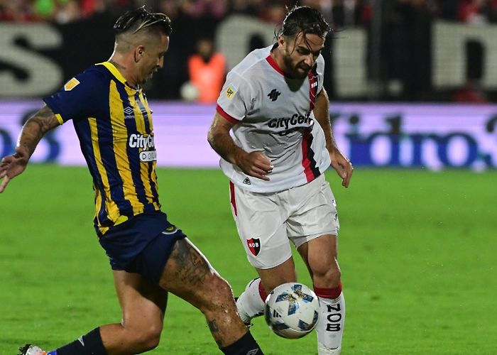 Newells Old Boys Stadium Rosario Central fans fly glider over stadium dropping leaflets ... photo